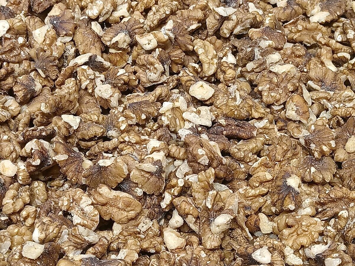 توپک خرمایی با کنجد و پودر گردو